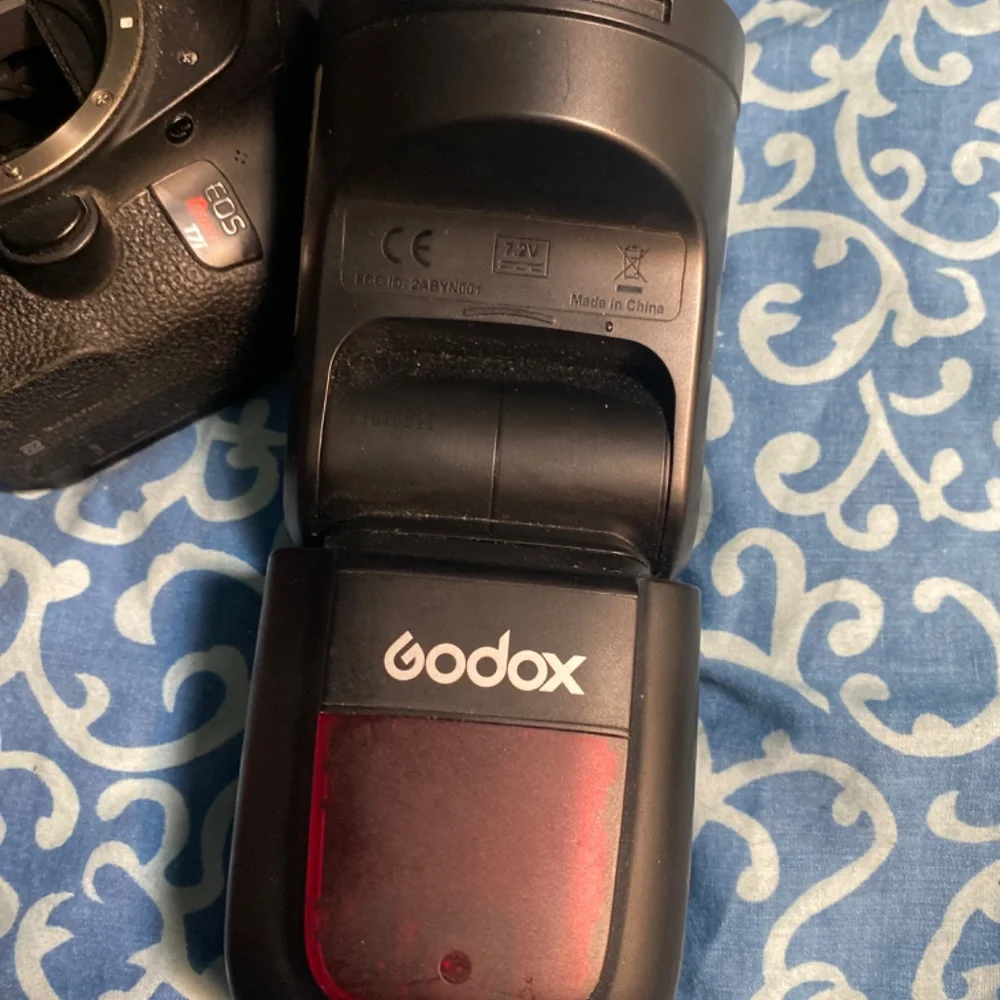 Canon T7i, Canon 50mm lens, Godax V1c flash